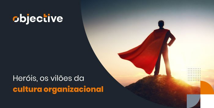 Imagem de um homem de terno e capa e ao lado a escrita " Heróis, os vilões da cultura organizacional"