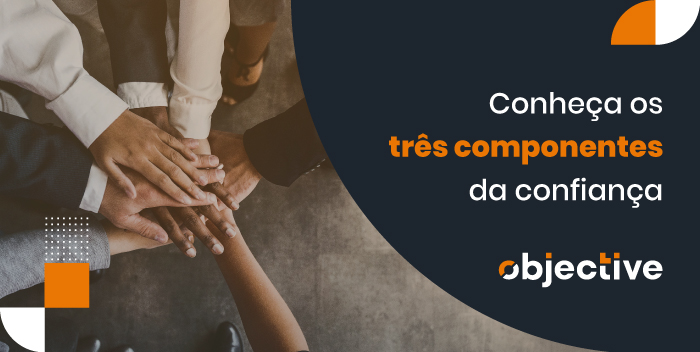 várias mãos uma em cima da outra e ao lado o título do artigo Conheça os três componentes da confiança